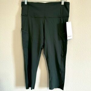 Lululemon fast and free HR crop 19”. Size 10. Dusty forest green. Tags on
